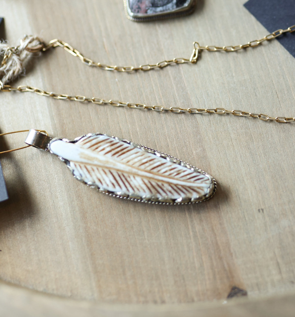 Hand-Carved Feather Pendant