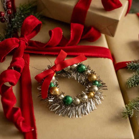 BEADED WREATH ORNAMENT W/ TINSEL